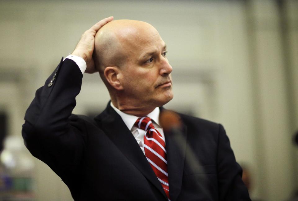 Michael Drewniak, chief spokesman for Gov. Chris Christie, waits to testify as he appears in Trenton, N.J., Tuesday, May 13, 2014, before the state legislature's Select Committee on Investigation, which is probing the politically motivated closure of access lanes to the George Washington Bridge in Fort Lee last September. (AP Photo/Mel Evans)