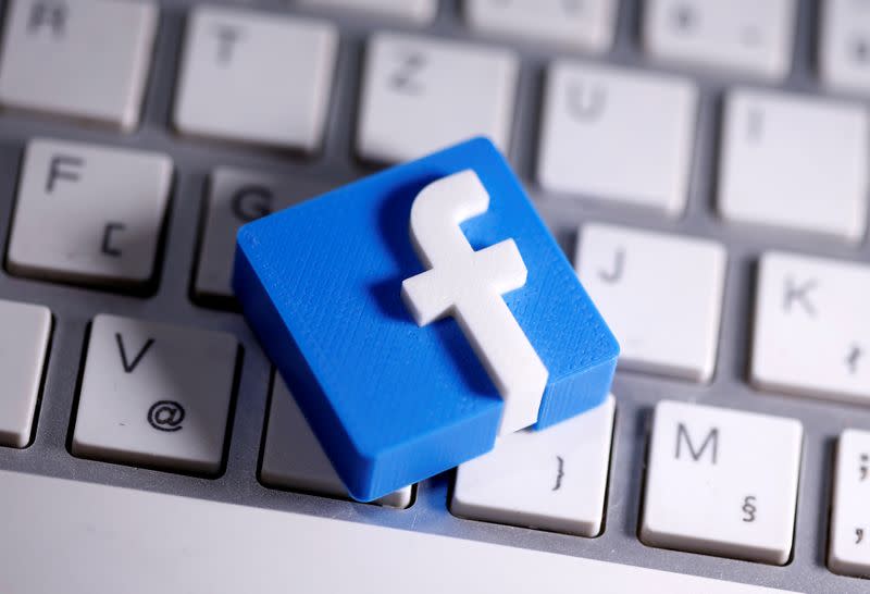 FILE PHOTO: A 3D-printed Facebook logo is seen placed on a keyboard in this illustration