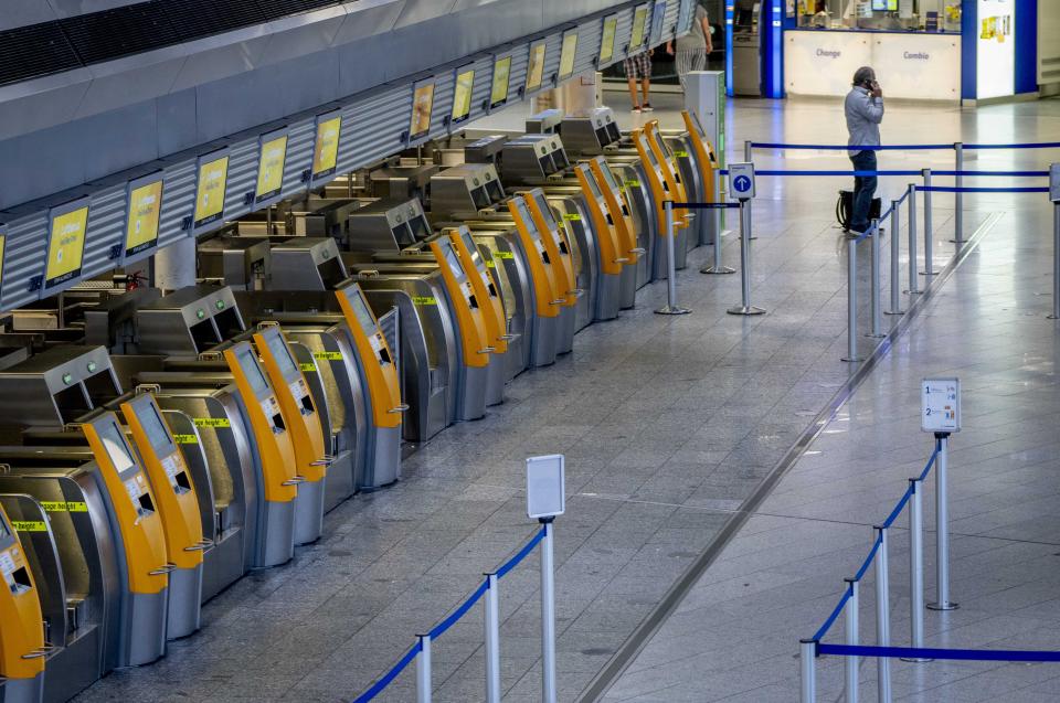 Empty Lufthansa check in counters are pictured at the international airport in Frankfurt, Germany, Wednesday, July 27, 2022. Lufthansa went for a 24-hours-strike on Wednesday, most of the Lufthansa flights had to be cancelled. (AP Photo/Michael Probst)