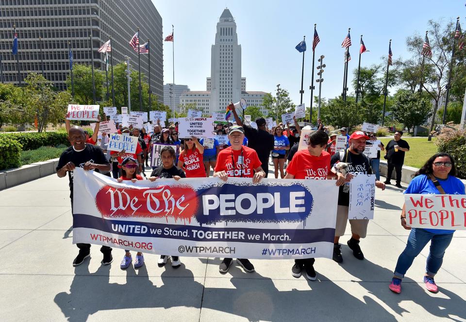 After Supreme Court setbacks on affirmative action and LGBTQ+ rights, activists and advocates march in Los Angeles on July 2, 2023.