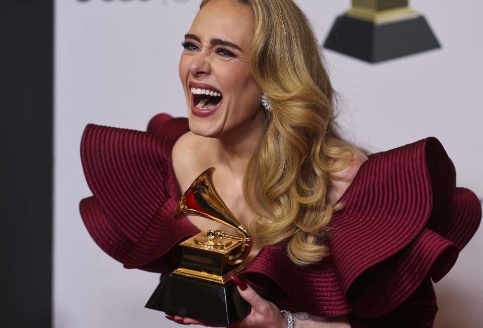 <div class="inline-image__caption"><p>Adele poses with her Grammy for Best Pop Solo Performance for "Easy On Me" during the 65th Annual Grammy Awards in Los Angeles, California, U.S., February 5, 2023.</p></div> <div class="inline-image__credit">REUTERS/Mike Blake</div>