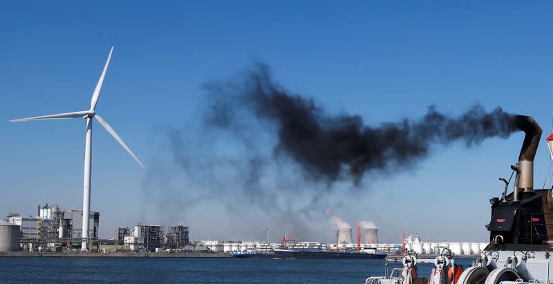 FILE PHOTO: Smoke rises from a pilot boat in the port of Antwerp