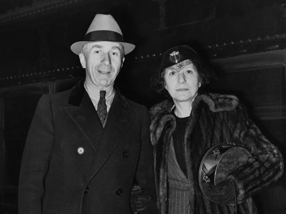 American film producer Harry Warner (1881 - 1958), President of Warner Bros. Pictures, Inc, and his wife Rea arrive in New York on the 20th Century Limited train, 20th January 1938.
