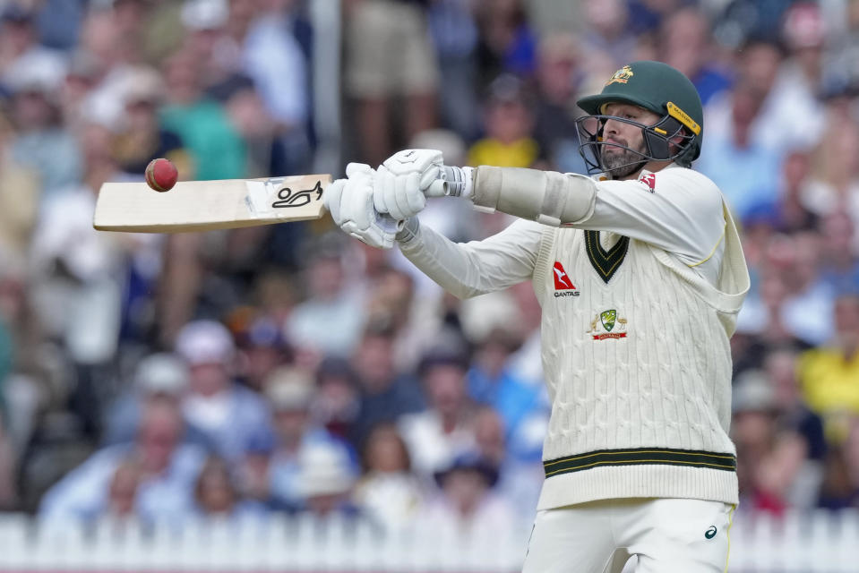 Australia's Nathan Lyon plays a shot during the fourth day of the second Ashes Test match between England and Australia, at Lord's cricket ground in London, Saturday, July 1, 2023. (AP Photo/Kirsty Wigglesworth)