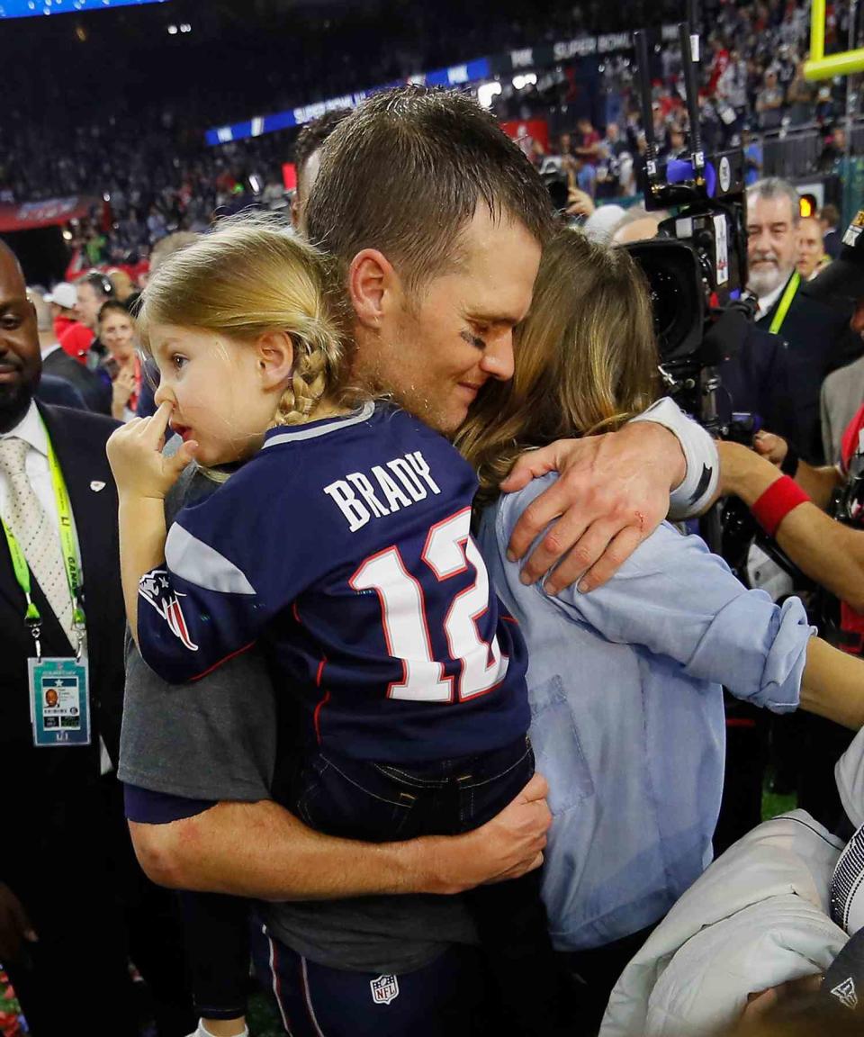 Tom Brady #12 of the New England Patriots celebrates with wife Gisele Bundchen and daughter Vivian Brady after defeating the Atlanta Falcons during Super Bowl 51 at NRG Stadium on February 5, 2017 in Houston, Texas. The Patriots defeated the Falcons 34-28