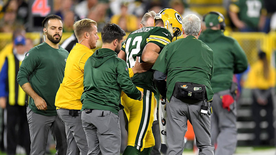 Rodgers match looked over when he was taken off the field. Pic: Getty