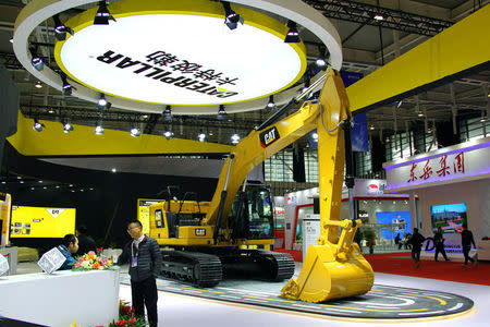 A Caterpillar excavator is displayed at the World Intelligent Manufacturing Summit in Nanjing, Jiangsu province, China December 6, 2017. REUTERS/Stringer/Files