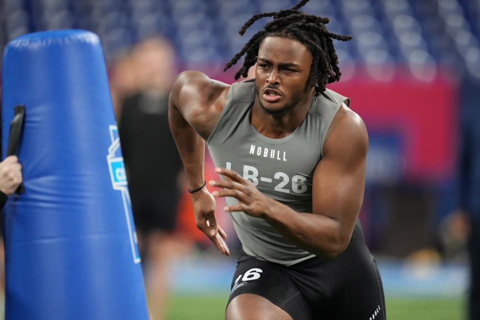 Alabama linebacker Dallas Turner (LB26) works out during the 2024 NFL Combine at Lucas Oil Stadium.