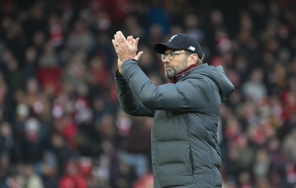 Liverpool's manager Jurgen Klopp greets fans after the English Premier League soccer match between Liverpool and Watford at Anfield stadium in Liverpool, England, Saturday, Dec. 14, 2019. (AP Photo/Rui Vieira)