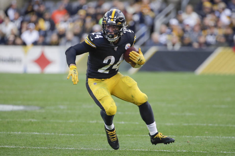 FILE - In this Dec. 1, 2019, file photo, Pittsburgh Steelers running back Benny Snell (24) plays against the Cleveland Browns during an NFL football game, in Pittsburgh. Snell wants to prove the flashes he showed last season were just a sign of things to come. (AP Photo/Gene J. Puskar, File)