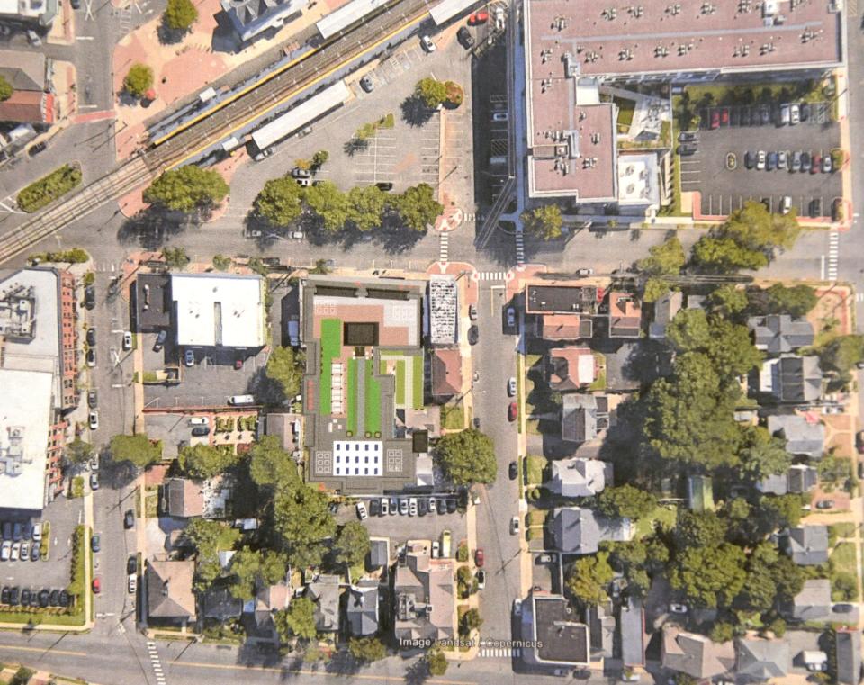 A rendering of a proposed condominium building in the center, across from the Red Bank train station and in comparison with the Rail at Red Bank and the Anderson Building, presented on Wednesday, July 24, 2024, at Borough Hall in Red Bank, New Jersey.