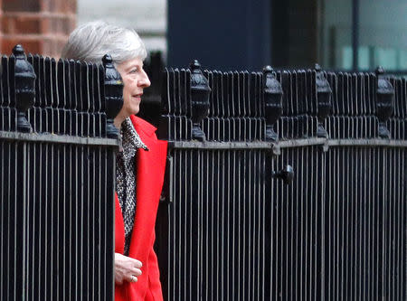 Britain's Prime Minister Theresa May leaves 10 Downing Street via the back exit in London, Britain, November 16, 2018. REUTERS/Peter Nicholls