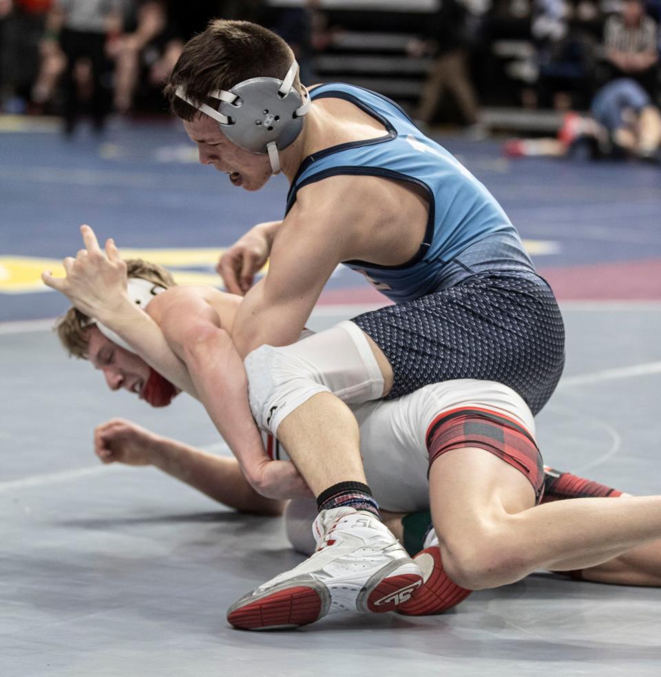 Ryan Ball (Somers-North Salem) wrestlers against Austin Zimmerman (St. Joseph Collegiate) at the NYSPHSAA Wrestling Championships at the MVP Arena.