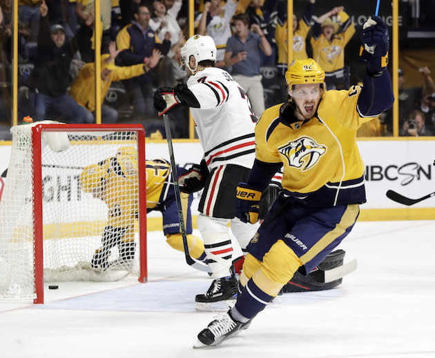 Nashville Predators center Ryan Johansen (92) celebrates after teammate Roman Josi scored a goal against the Chicago Blackhawks during the second period in Game 4 of a first-round NHL hockey playoff series Thursday, April 20, 2017, in Nashville, Tenn. (AP Photo/Mark Humphrey)