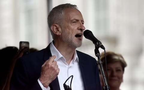  Jeremy Corbyn speaks to protesters - Credit: Peter Summers/Getty Images