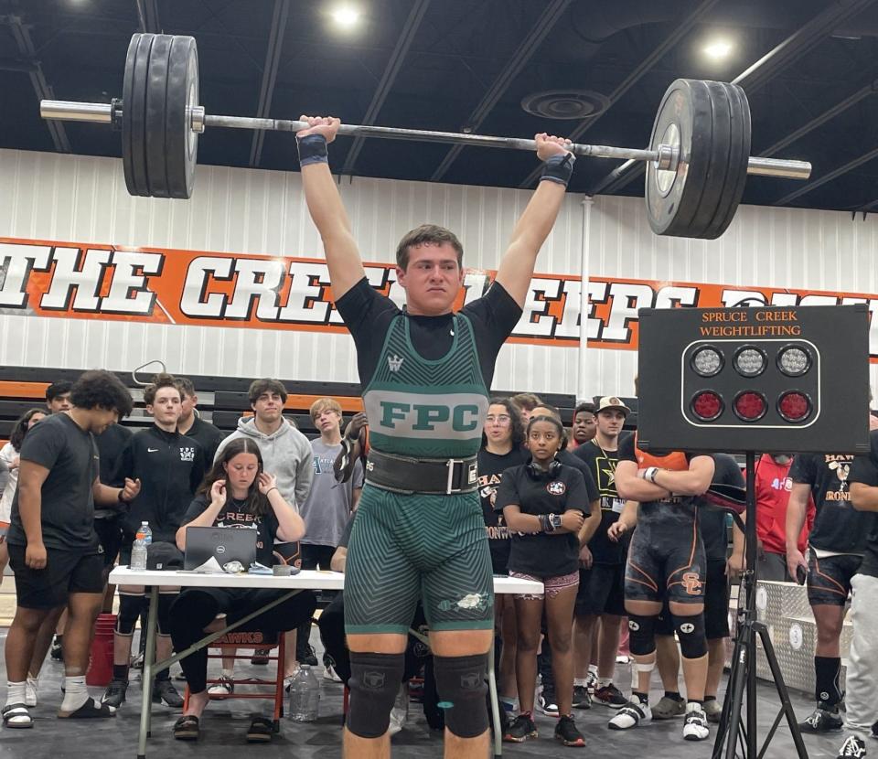 Flagler Palm Coast's Nick Groth hits a 300-pound clean and jerk on his first attempt during the Five Star Conference boys weightlifting meet.