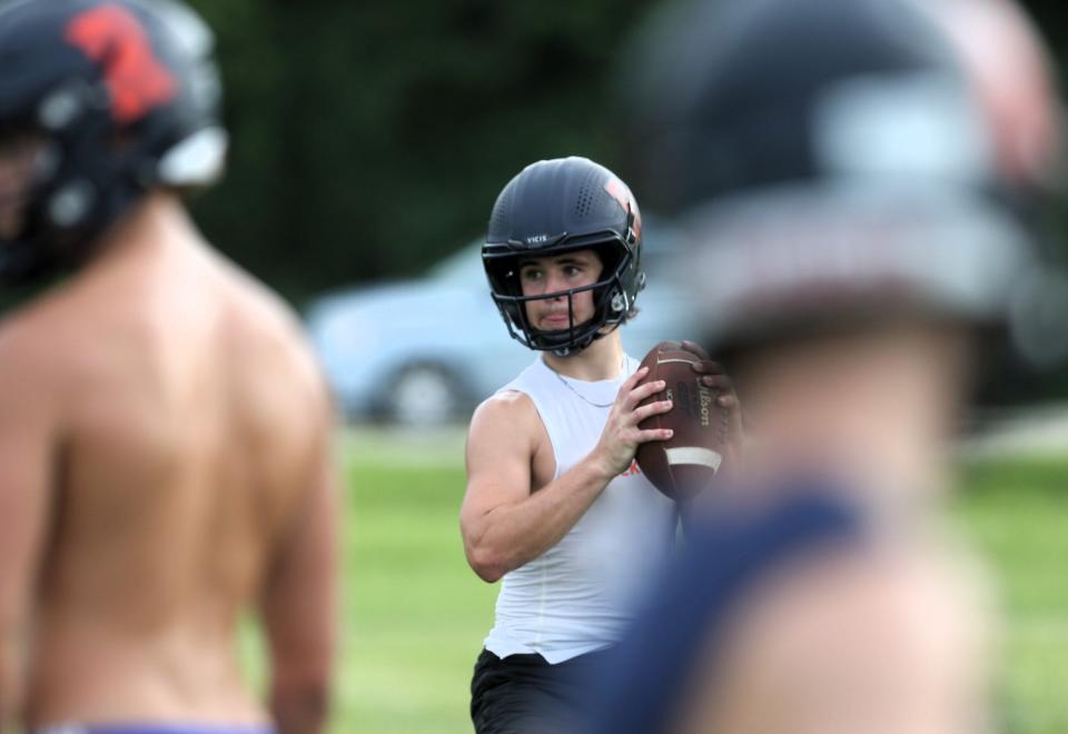 Rochester's Bryan Zulauf looks down the field during the first official day of practice at the high school on Monday, August 7, 2023.