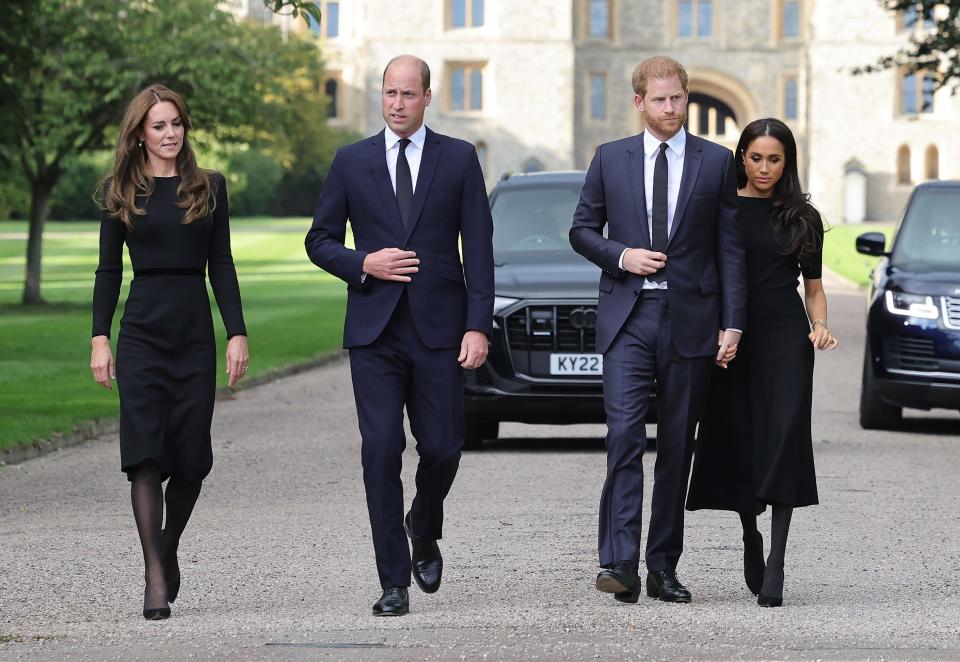 Princess Kate, Princess of Wales, Prince William, Prince of Wales, Prince Harry, Duke of Sussex, and Meghan, Duchess of Sussex, on the long Walk at Windsor Castle, arriving to view flowers and tributes to Queen Elizabeth II on Sept. 10, 2022.