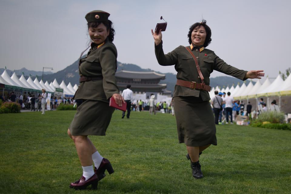 North Korean defectors wearing the country's military uniforms dance at a "<a href="http://english.yonhapnews.co.kr/news/2015/05/21/0200000000AEN20150521008300315.html">unification expo</a>" in Seoul, South Korea, on May 29. The exposition commemorated the 70th anniversary of Korea's liberation from Japan's 35-year-long colonial rule.