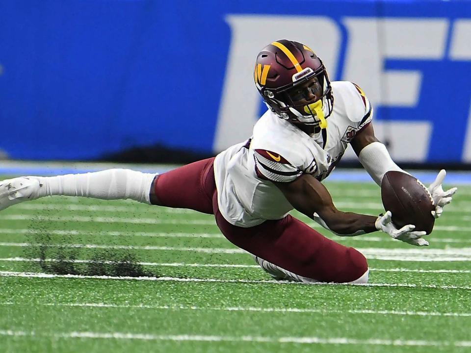 Terry McLaurin dives for a catch against the Detroit Lions.