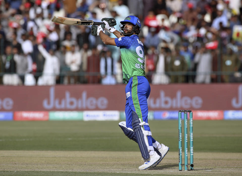 Multan Sultans batsman Shan Masood follows the ball after playing a shot for boundary during their Pakistan Super League T20 cricket match against Quetta Gladiators, in Multan, Pakistan, Saturday, Feb. 29, 2020. (AP Photo/K.M. Chaudary)