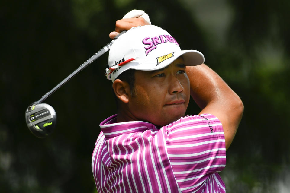 Hideki Matsuyama, of Japan, hits on the 12th tee during the first round in the World Golf Championship-FedEx St. Jude Invitational tournament, Thursday, Aug. 5, 2021, in Memphis, Tenn. (AP Photo/John Amis)