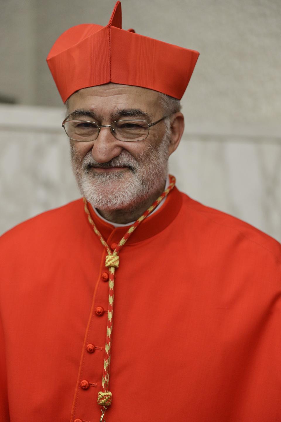 Cardinal Cristobal Lopez Romero poses for photographers prior to meeting relatives and friends after he was elevated to cardinal by Pope Francis, at the Vatican, Saturday, Oct. 5, 2019. Pope Francis has chosen 13 men he admires and whose sympathies align with his to become the Catholic Church's newest cardinals. (AP Photo/Andrew Medichini)