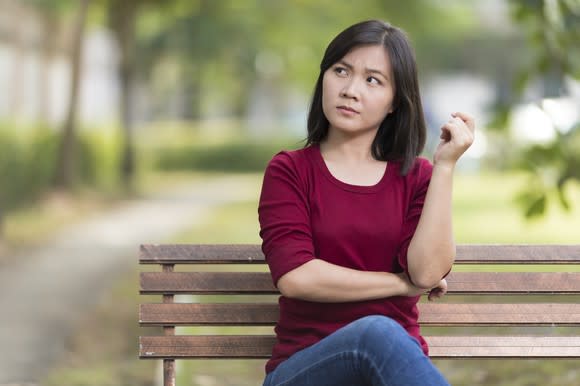 Woman looking unsure and confused