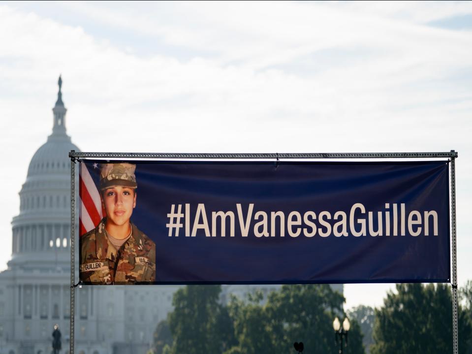 A banner with the image of slain Army Secialist Vanessa Guillen and #IAmVanessaGuillen is displayed before the start of a news conference on the National Mall in Washington, DC on 30 July ((Associated Press))