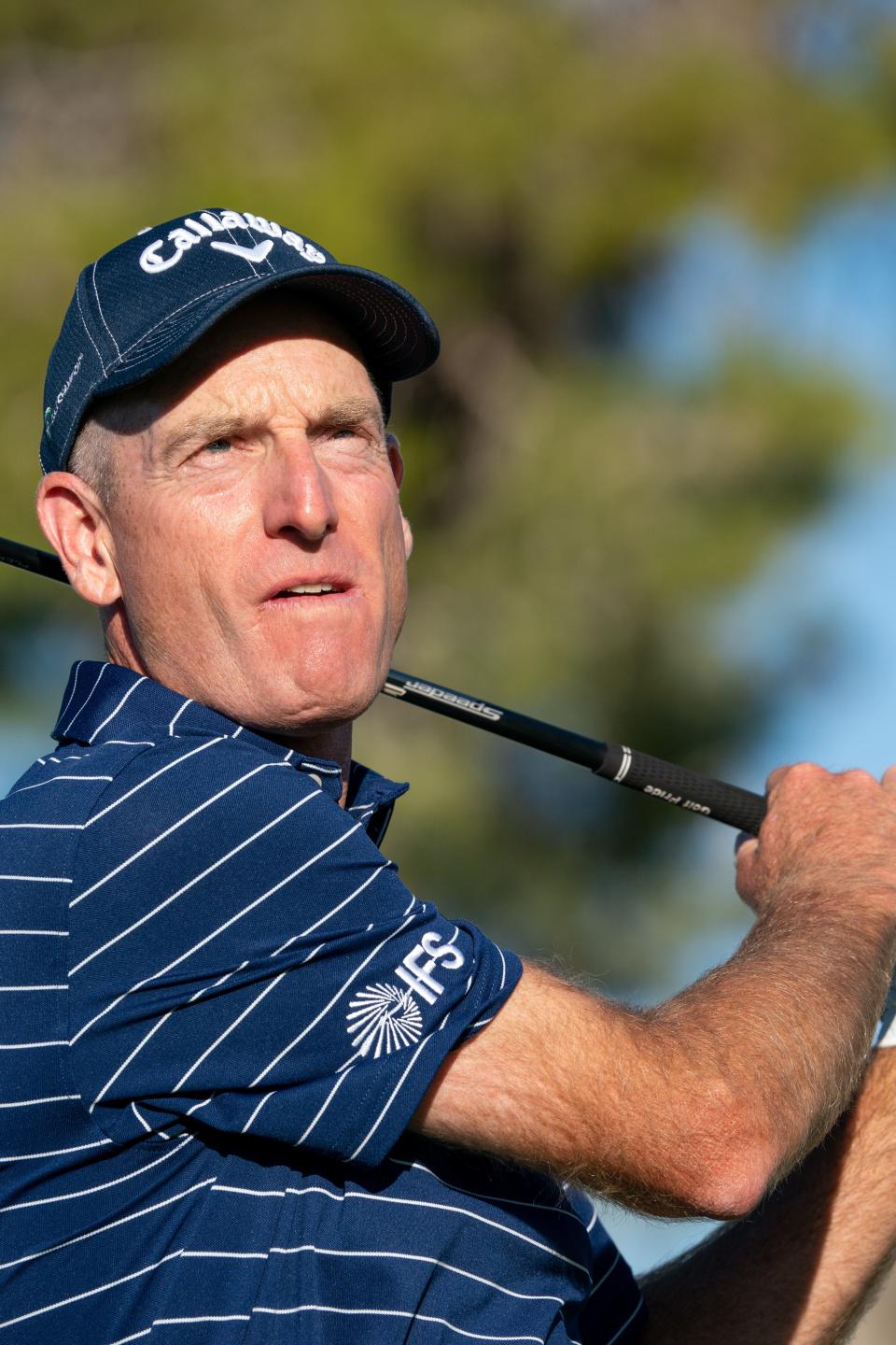 Jim Furyk reacts after hitting his tee shot on the 17th hole during the third round of the Charles Schwab Cup Championship golf tournament at Phoenix Country Club.