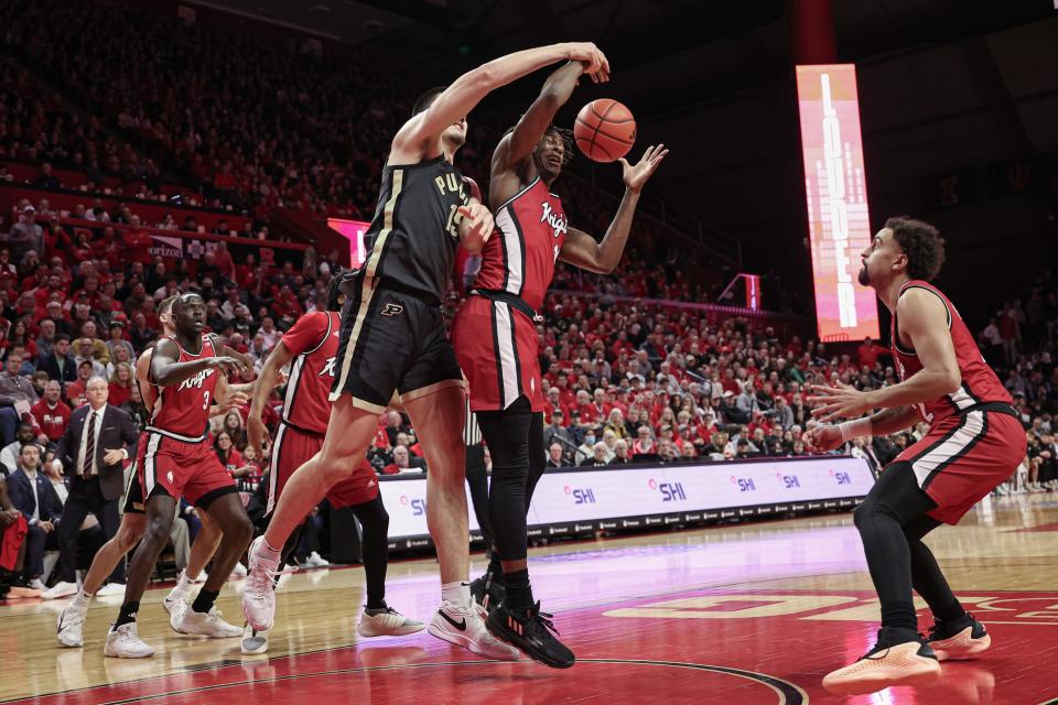 Jan 28, 2024; Piscataway, New Jersey, USA; Purdue Boilermakers center Zach Edey (15) rebounds rebounds against Rutgers Scarlet Knights forward Antwone Woolfolk (13) during the first half at Jersey Mike's Arena. Mandatory Credit: Vincent Carchietta-USA TODAY Sports