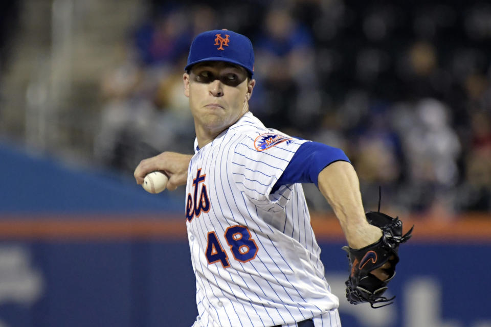 FILE - In this Sept. 26, 2018, file photo, New York Mets pitcher Jacob deGrom delivers the ball to the Atlanta Braves during the second inning of a baseball game in New York. NL Cy Young Award winner Jacob deGrom and the New York Mets agreed to a $17 million, one-year contract, a record raise for an arbitration-eligible player from his $7.4 million salary. The deal was agreed to Friday, Jan. 11, 2019, before the pitcher and team were to exchange proposed salaries in arbitration.(AP Photo/Bill Kostroun, File)