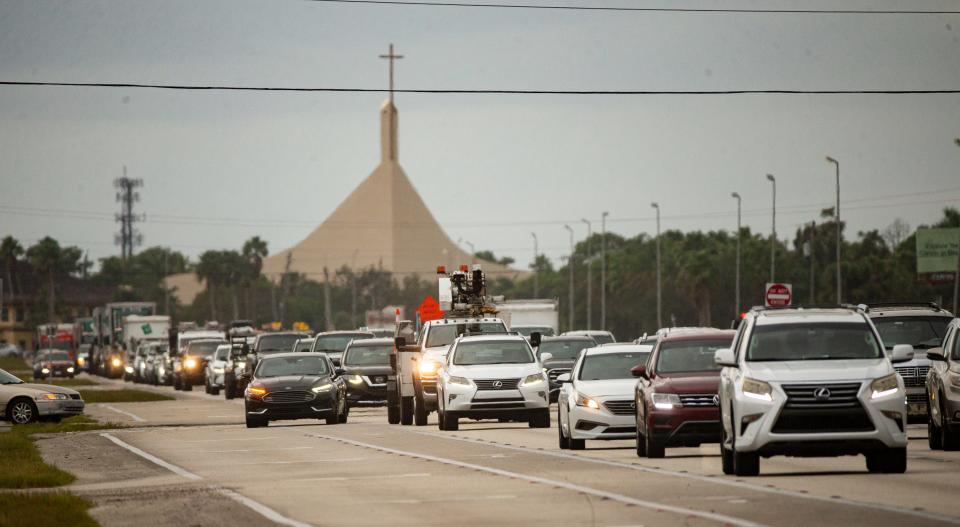 Traffic backs on Colonial Boulevard in Fort Myers heading east towards I-75 during afternoon rush hour on Monday, Nov. 13, 2023.