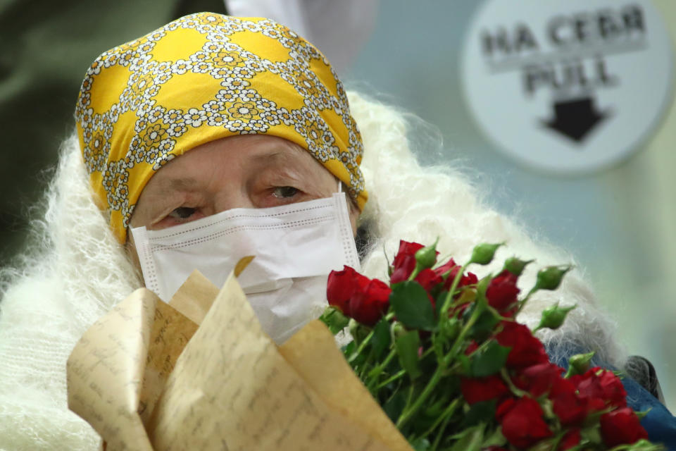 MOSCOW, RUSSIA - MAY 13, 2020: 100-year-old Pelageya Poyarkova being discharged from an infectious diseases facility of the Federal Brain and Neurotechnologies Center of the Russian Federal Medical Biological Agency (FMBA) as she has recovered from the COVID-19 disease. Valery Sharifulin/TASS (Photo by Valery Sharifulin\TASS via Getty Images)