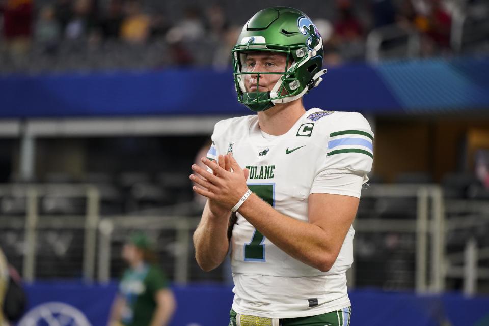 Tulane quarterback Michael Pratt (7) warms up prior to the Cotton Bowl NCAA college football game against Southern California, Monday, Jan. 2, 2023, in Arlington, Texas. (AP Photo/Sam Hodde)