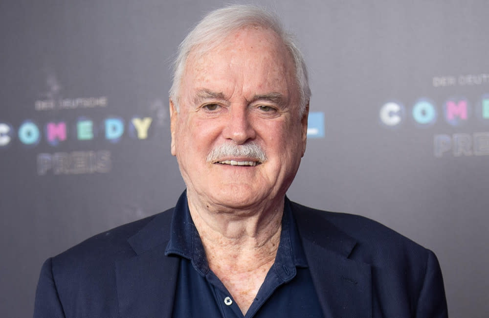 John Cleese has communicated with his late Monty Python co-star credit:Bang Showbiz