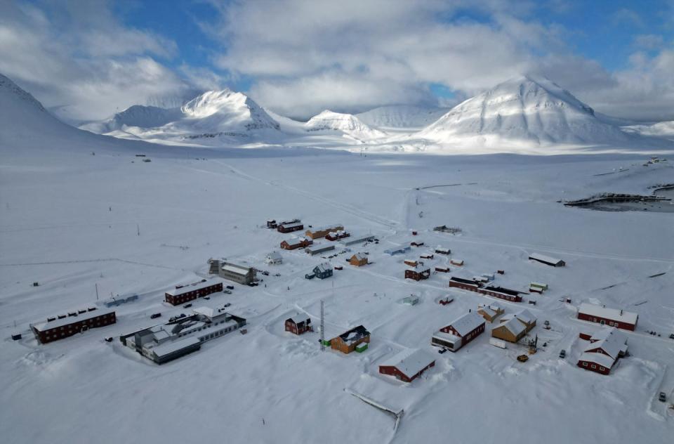 Houses are seen in the town of Ny-Alesund (Reuters)