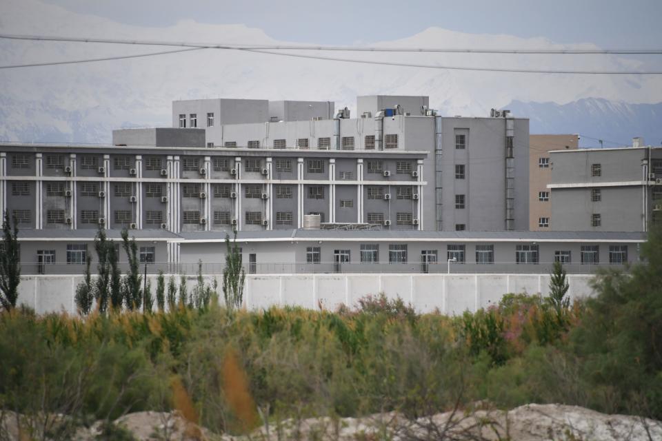 File Image: This photo taken on 4 June 2019 shows a facility believed to be a re-education camp where mostly Muslim ethnic minorities are detained, north of Akto in China's northwestern Xinjiang region (AFP via Getty Images)