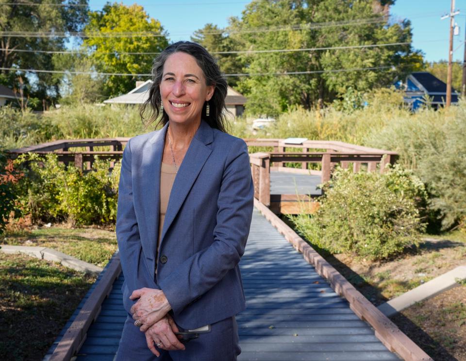 Laura Briefer, director of Salt Lake City Department of Public Utilities, stands in a constructed wetland at 900 South before it empties into the Jordan River in Salt Lake City on Monday, Sept. 25, 2023. | Bethany Baker, The Salt Lake Tribune