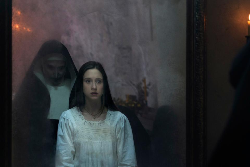Sister Irene (Taissa Farmiga) is haunted by the demonic nun Valak (Bonnie Aarons) in the "Conjuring" spinoff "The Nun."