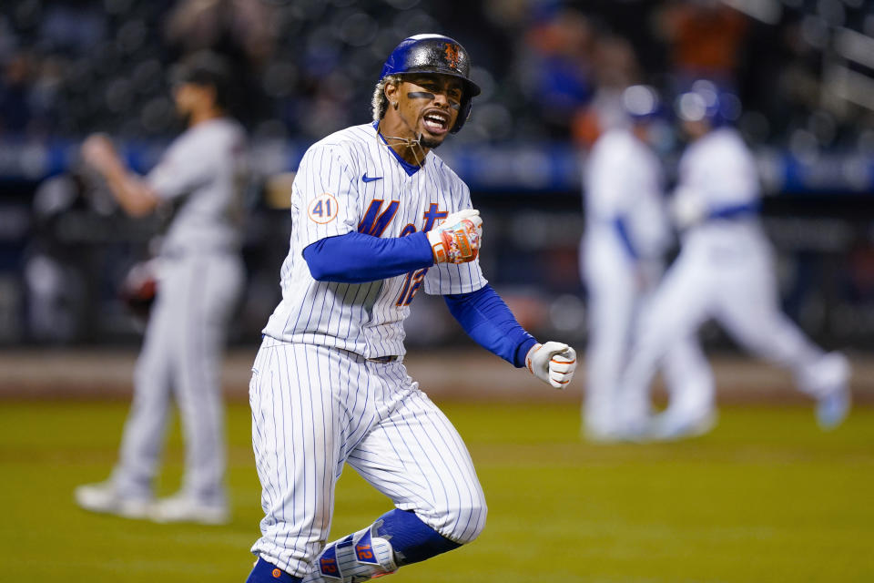 New York Mets' Francisco Lindor runs the bases after hitting a two-run home run off Arizona Diamondbacks relief pitcher Caleb Smith during the seventh inning of a baseball game, Friday, May 7, 2021, in New York. (AP Photo/John Minchillo)