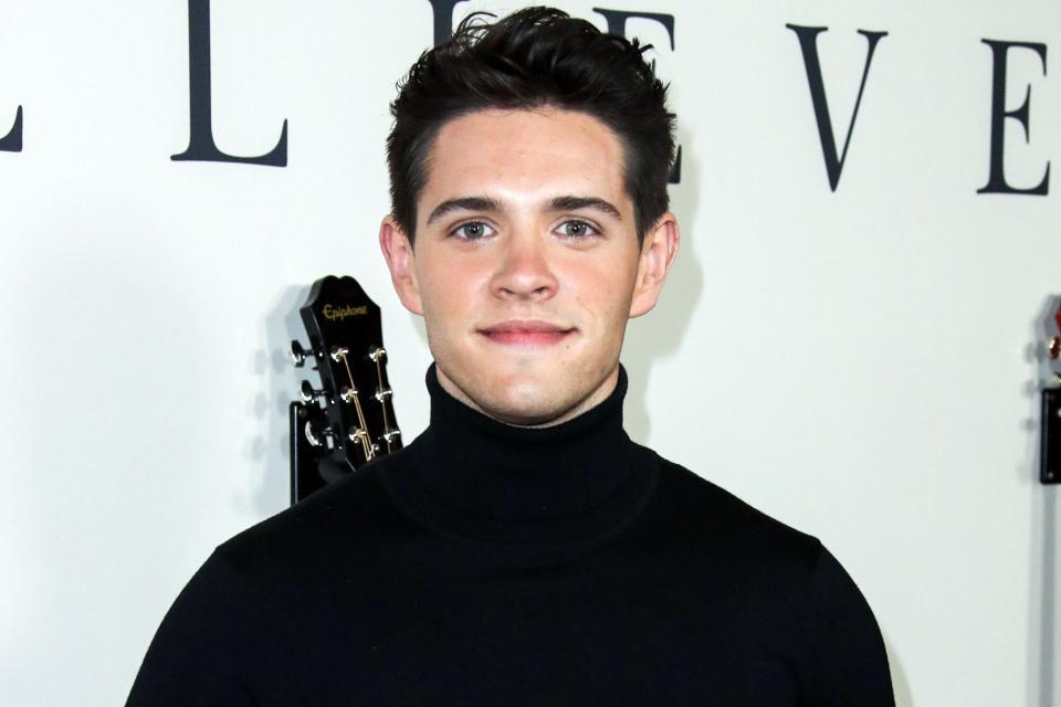 Casey Cott arrives at the Los Angeles premiere of 