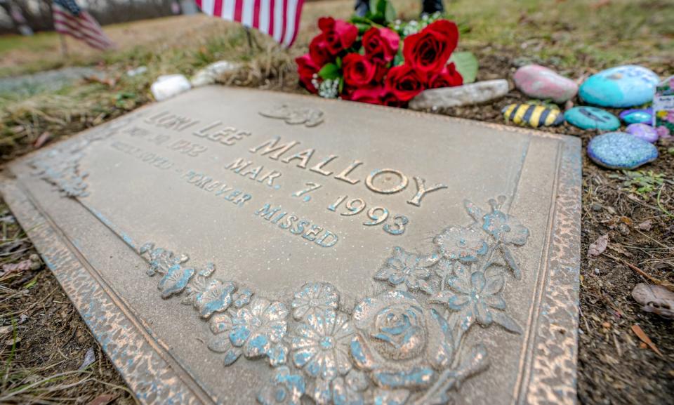 The gravestone of Lauren Lee Malloy's mother in East Providence. The body was recently exhumed as authorities take a fresh look at the cause of death, originally ruled to be natural causes.