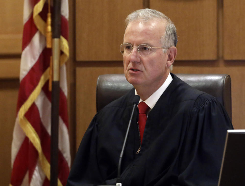 Judge Frank Remington presides during former Wisconsin Supreme Court Justice Michael Gableman's hearing, Friday, June 10, 2022, at the Dane County Courthouse in Madison, Wis. Gableman, an investigator hired by Republicans to look into former President Donald Trump's 2020 loss in the battleground state, was found in contempt after he berated the judge and refused to answer any questions on the witness stand. (Amber Arnold/Wisconsin State Journal via AP)