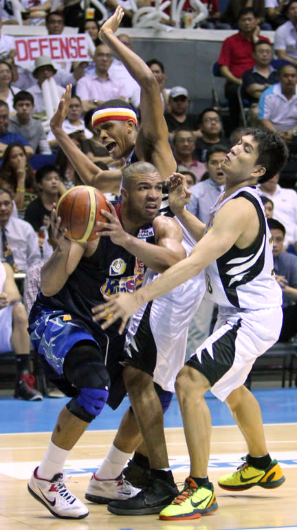 Jamelle Cornley is double-teamed by James Yap and Rafi Reavis. (PBA Images)