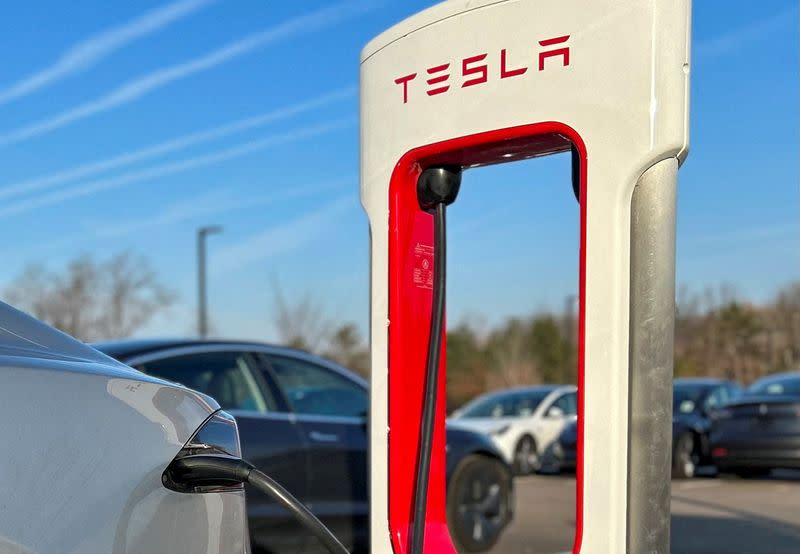 FILE PHOTO: Tesla Supercharger station at a Tesla store in Ann Arbor, Michigan