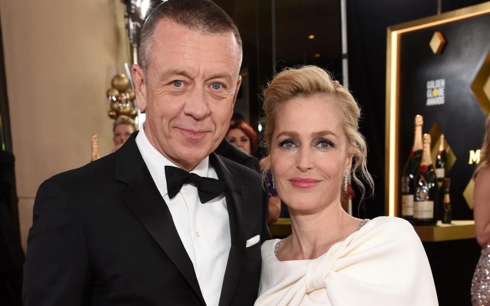 The Crown writer Peter Morgan with his partner Gillian Anderson, who plays Margaret Thatcher - Getty