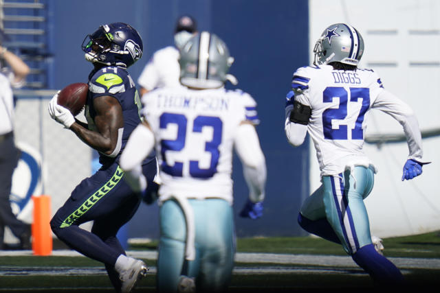 Seattle Seahawks wide receiver DK Metcalf (14) during an NFL football game  against the Denver Broncos, Monday, Sept. 12, 2022, in Seattle, WA. The  Seahawks defeated the Bears 17-16. (AP Photo/Ben VanHouten