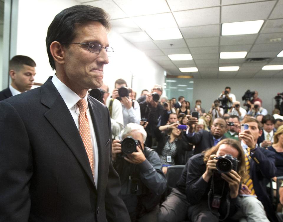 Then House Majority Leader Eric Cantor of Virginia, arrives for news conference on Capitol Hill in Washington, Wednesday, June 11, 2014. Repudiated at the polls, Cantor resigned his leadership post. (AP Photo/Manuel Balce Ceneta)