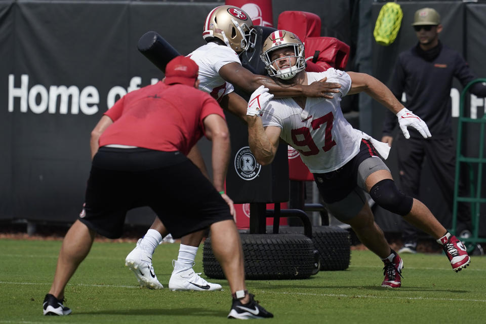 San Francisco 49ers defensive end Nick Bosa (97) works against defensive end Dee Ford at NFL football training camp in Santa Clara, Calif., Thursday, July 29, 2021. (AP Photo/Jeff Chiu)